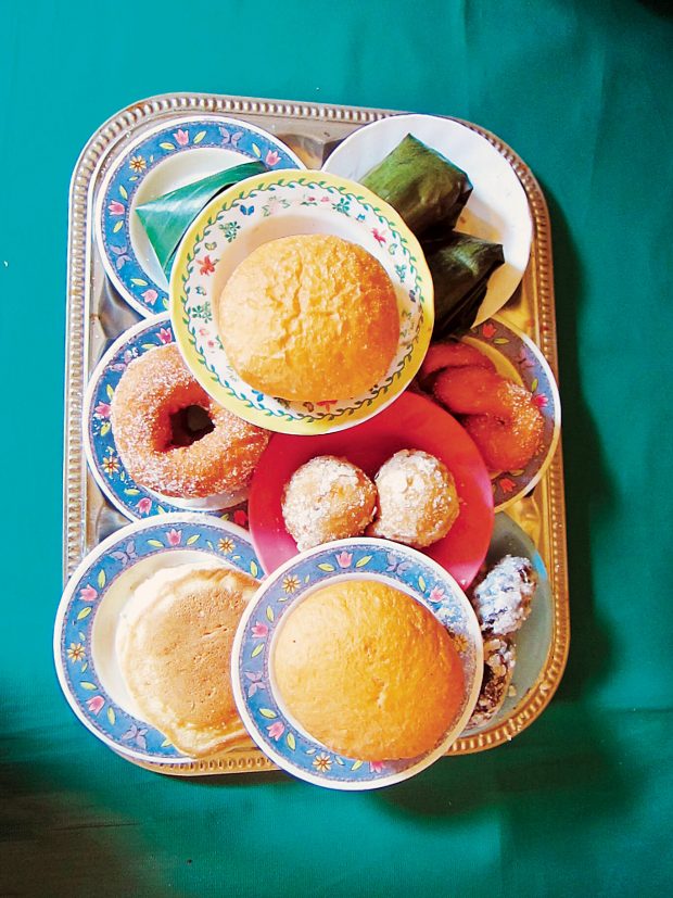 A plateful of pastries are served to all customers frequenting a small port side cafe, but you pay only for what you eat.