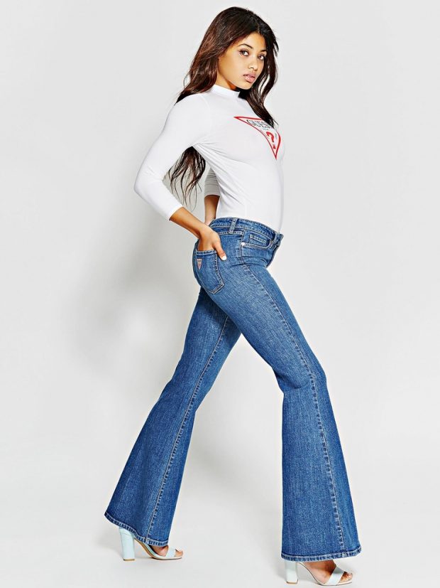 High-rise bell-bottom jeans, P8,998. Image from GUESS Originals.